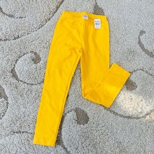 Hanna Andersson yellow leggings.